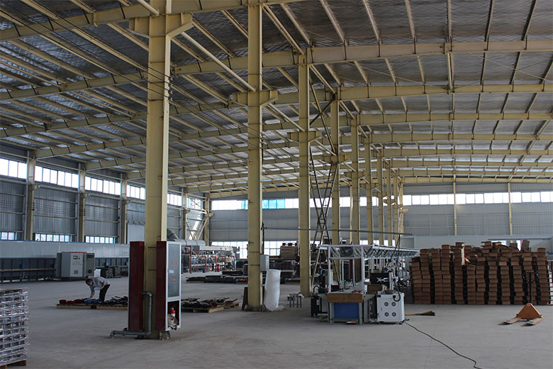 Production workshop and warehouse for enameled cast iron cookware